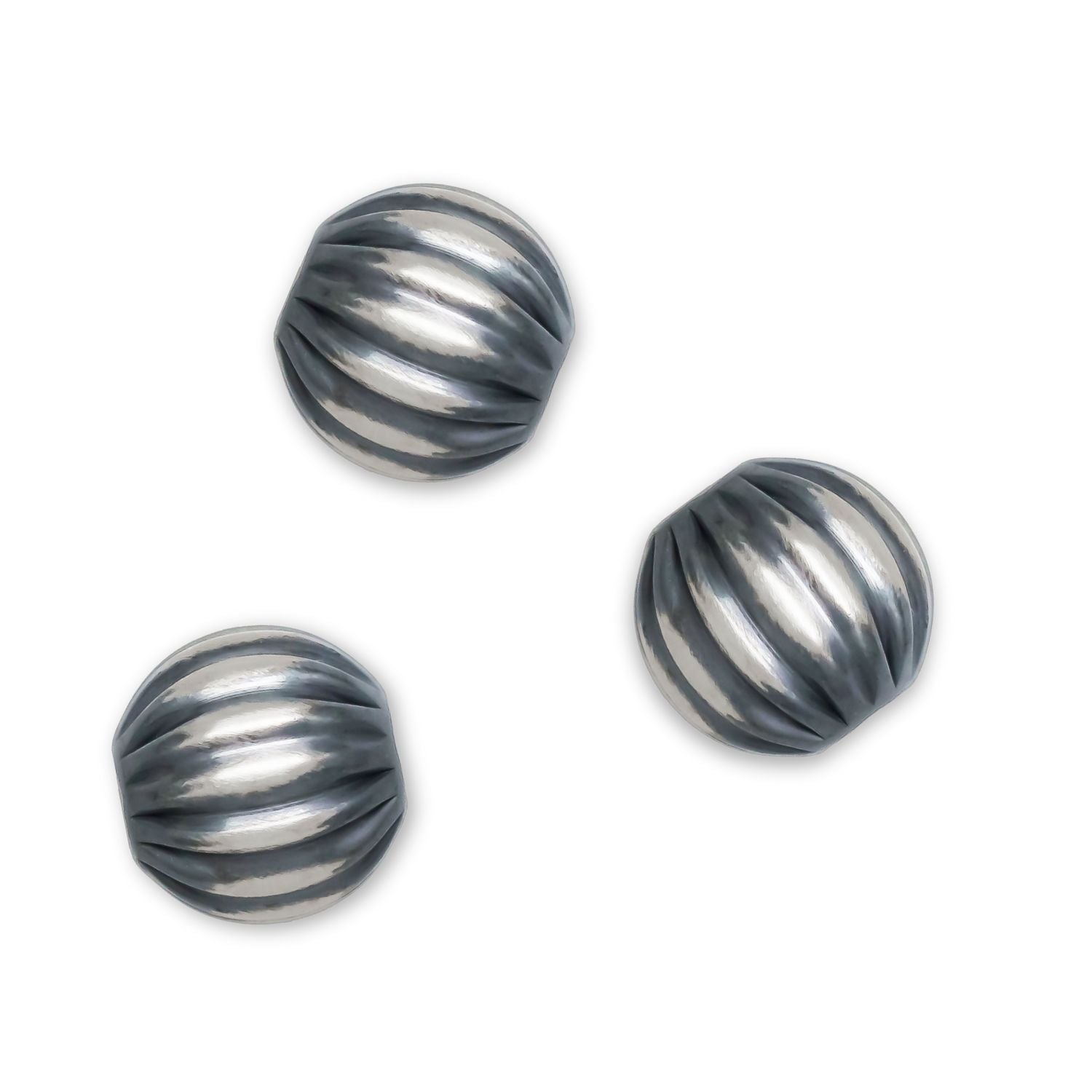 10mm Corrugated Navajo Beads on a white background.