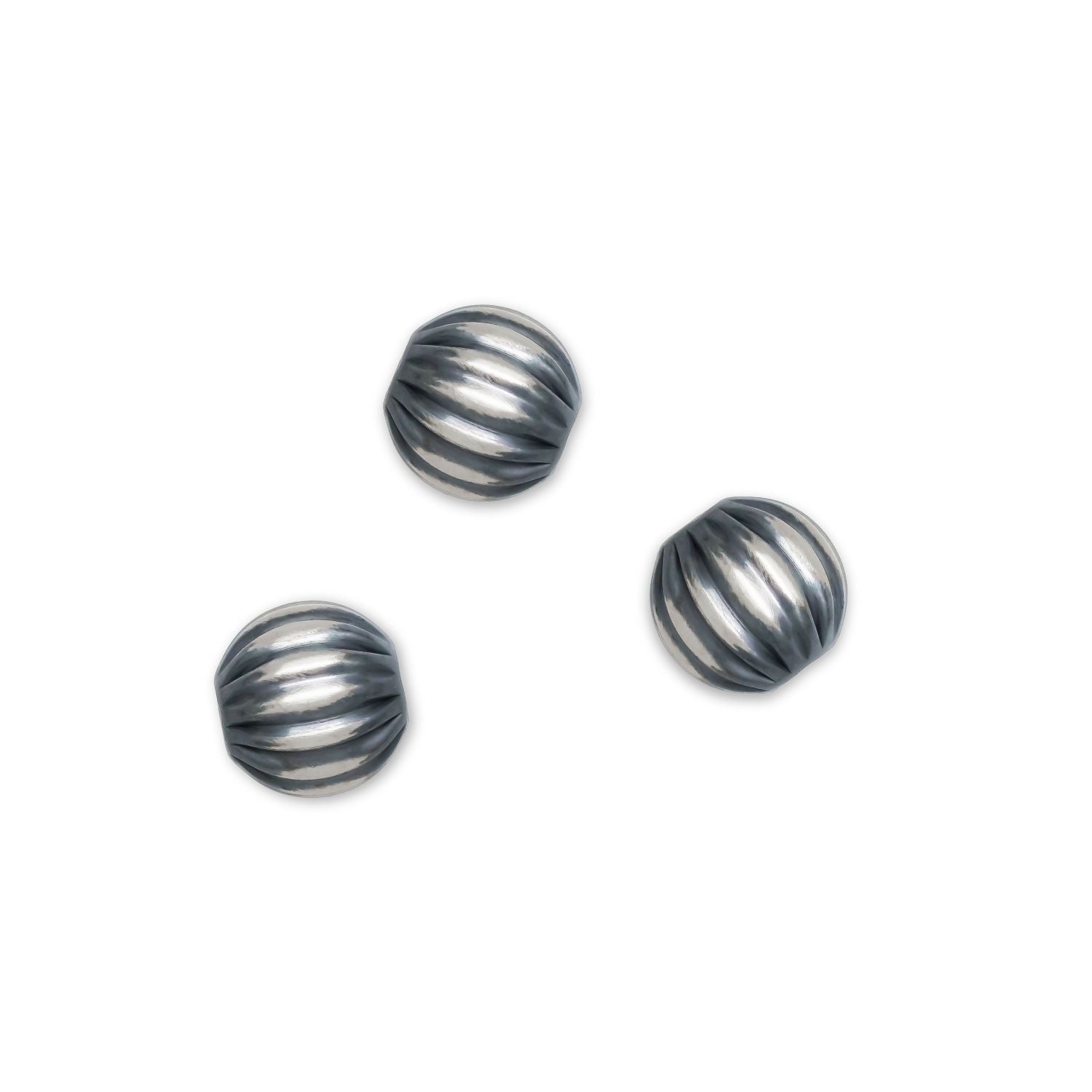 6mm Corrugated Navajo Beads on a white background.