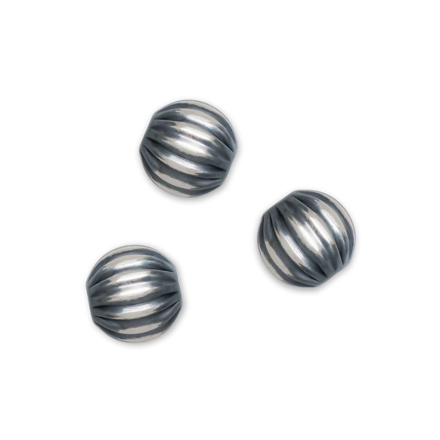 8mm Corrugated Navajo Beads on a white background.