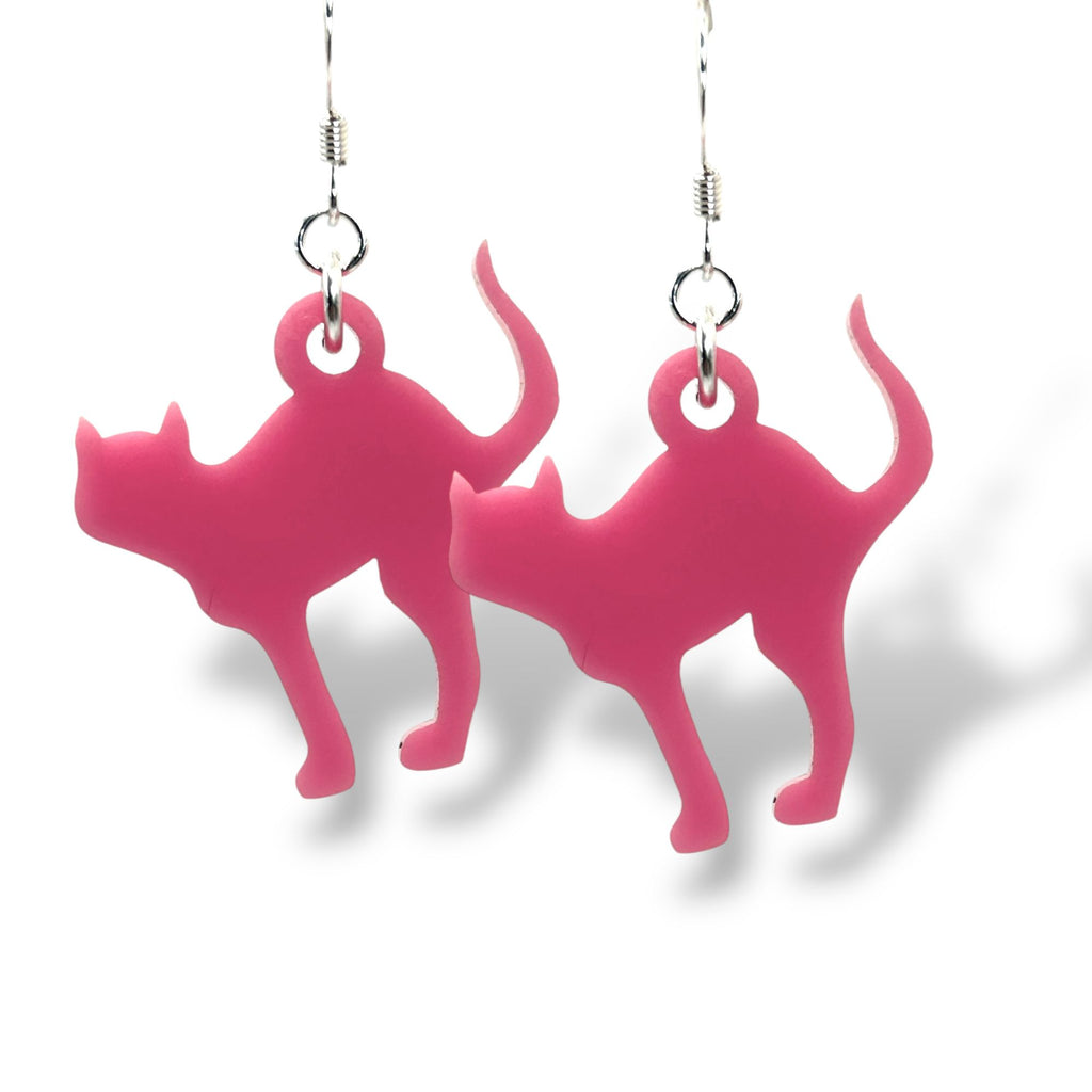 Pink cat-shaped earrings on a white background