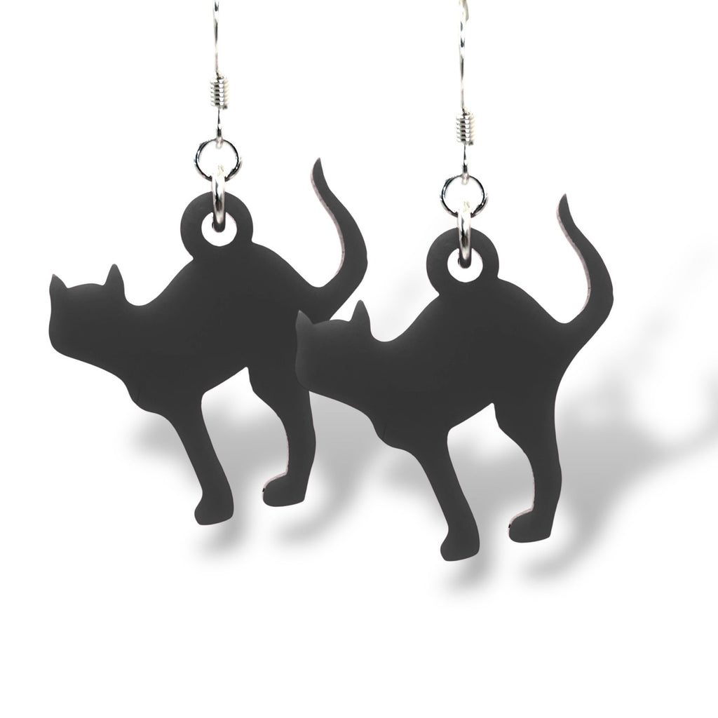 Black cat-shaped earrings on a white background