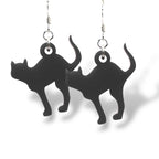 Black cat-shaped earrings on a white background