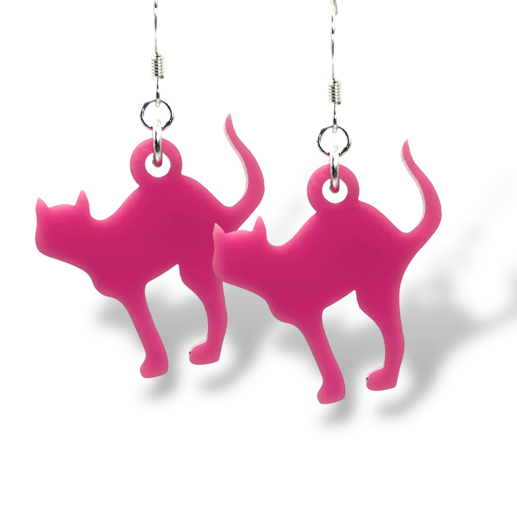 Pink cat-shaped earrings on a white background