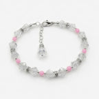 A silver-tone beaded bracelet featuring faceted clear crystal beads and small pink accent beads, displayed on a clean white background.