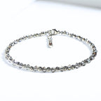 Silver bracelet on a white background