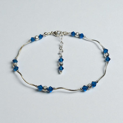 Detroit Lions assembled Silver bracelet kit with blue beads on a light gray background