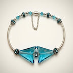 Bracelet with blue crystal arrow beads on a light background
