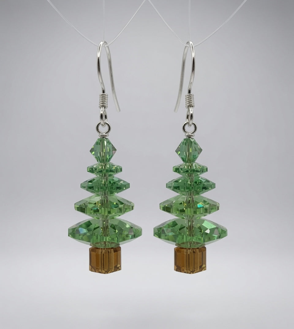Swarovski Crystal Peridot Christmas Tree Earrings on display stand - front view