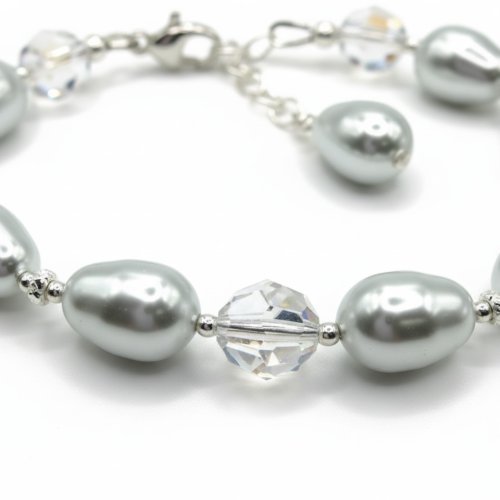 Close-up of crystal moonlight pearls, shimmer rounds, and sterling silver beads