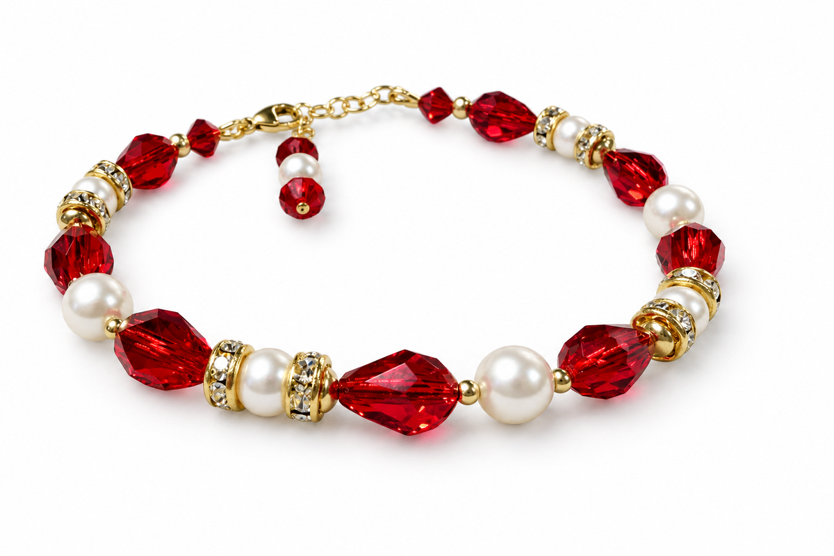 Assembled red Swarovski and pearl Christmas bracelet with gold accents on white