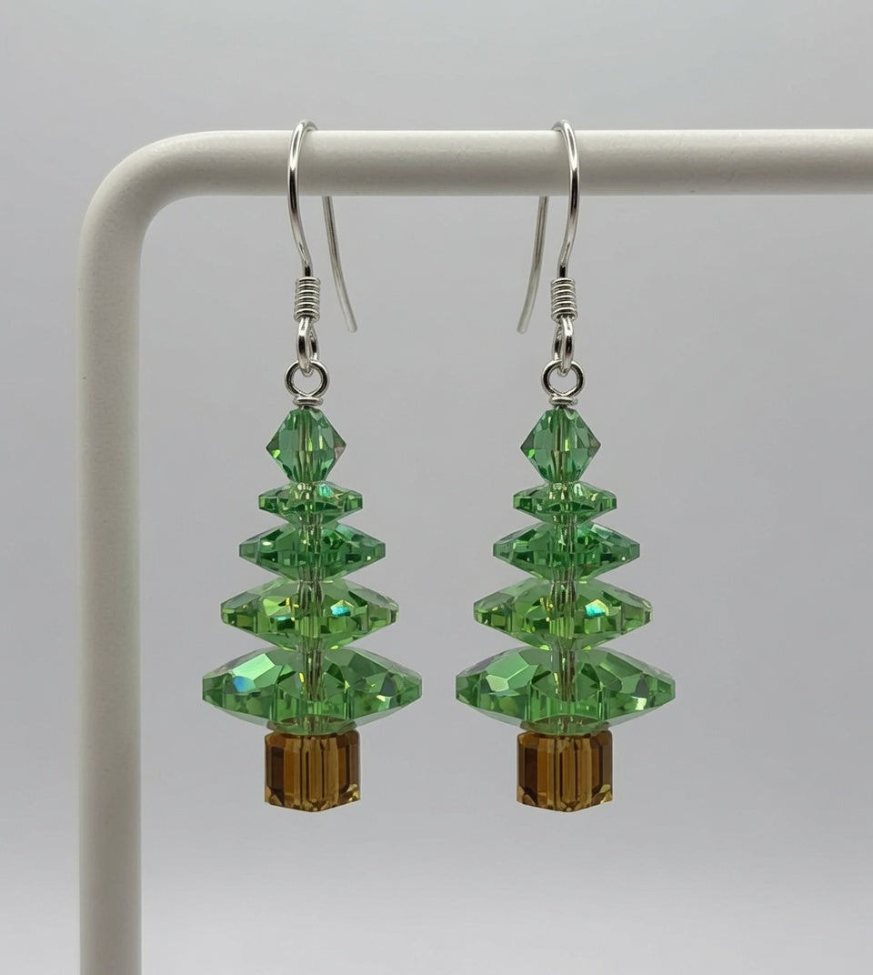 Swarovski Crystal Peridot Christmas Tree Earrings on display stand - pair view