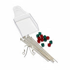 Set of sterling silver pins and red and green gemstones on a white background
