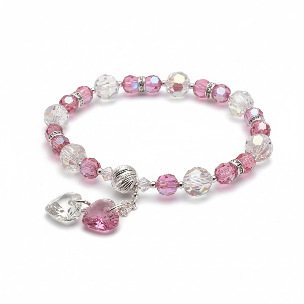 Pink and silver beaded bracelet on a white background